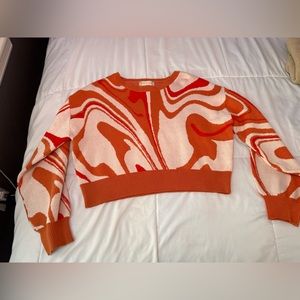 Orange and white Altar’d State cropped sweater.